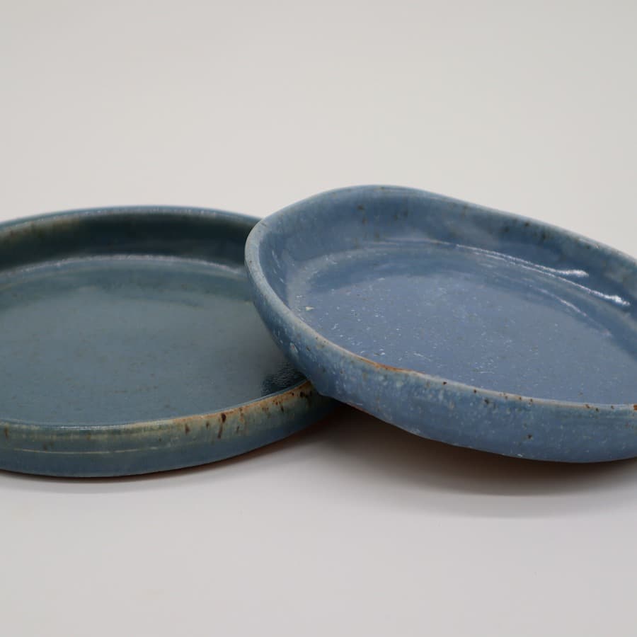 Custom handthrown periwinkle blue dishes — restaurant tableware